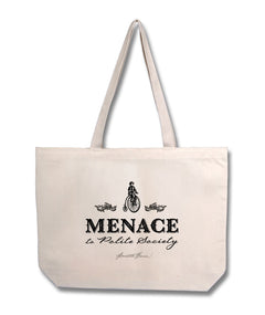 Mockup of natural cotton tote featuring a design of a woman on a pennyfarthing bicycle with the caption "Menace to Polite Society"