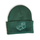 The Forest version of the Books Beanie embroidered with two books on the front of the cuff.