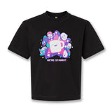 A black shirt with a design printed on the front. The design features smiling cast and characters from Drawfee surrounding a large pink star with the Drawfee logo in the center. Below the illustration is text that reads, "We're Starry!" From Drawfee.