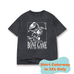 The front view of a faded black t-shirt. The design on the front of the shirt is an animal skeleton with limbs flailing about. The text around the skeleton reads, "Bone Game" and "We all have them, who needs them?" There is a label on the image that says this shirt colorway comes in 3XL only. From Drawfee.