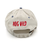 The back of a two-tone cap with an embroidered design above the strap. The design is of text that reads "Hog Wild" in red thread. From Drawfee.
