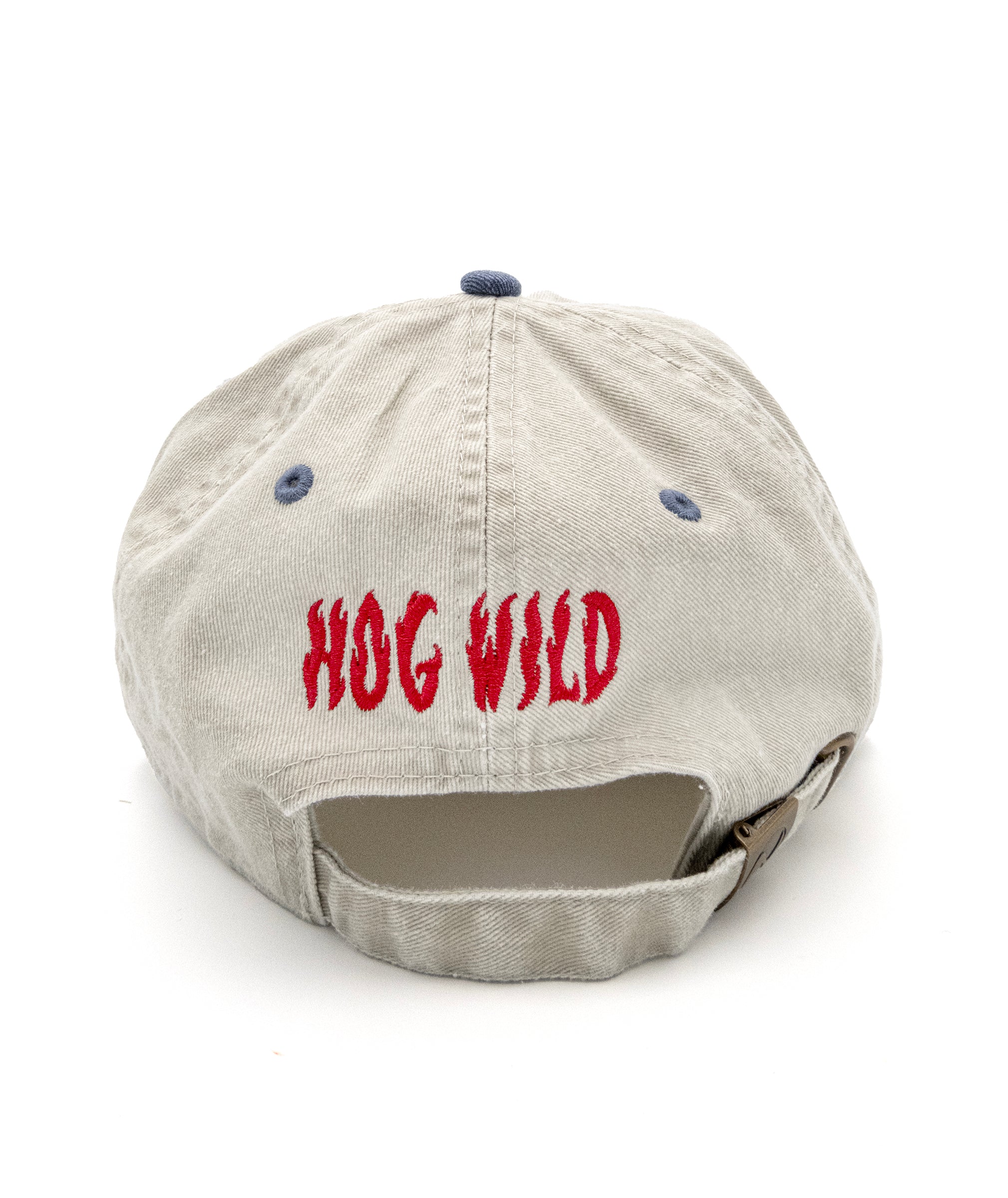 The back of a two-tone cap with an embroidered design above the strap. The design is of text that reads "Hog Wild" in red thread. From Drawfee.