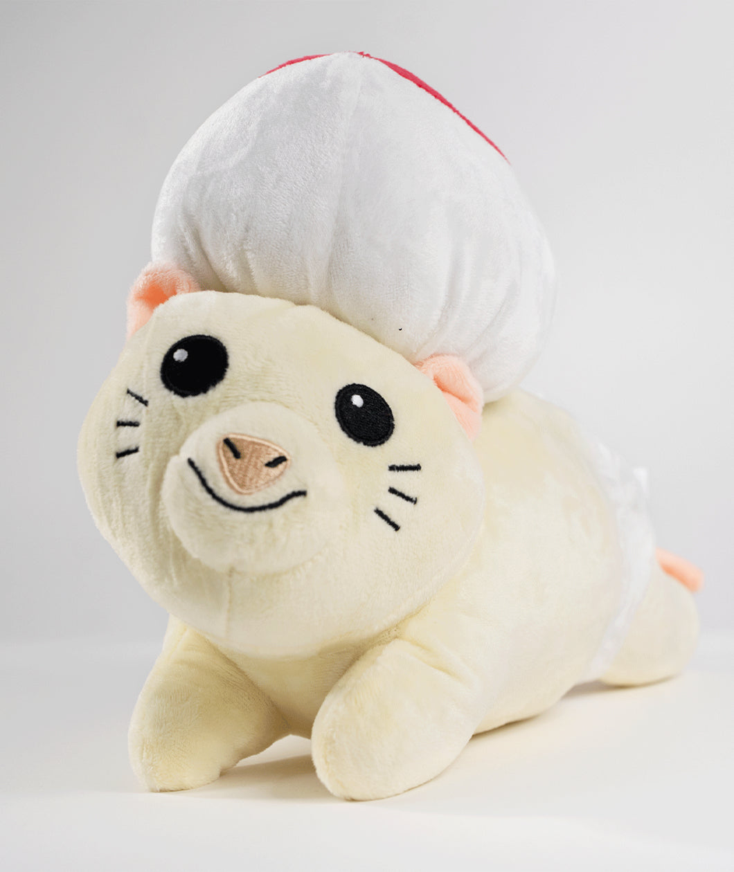 A front view photo of a mouse plushie with a round hat and a white diaper. The plushie is of Drawfee's character Todd. From Drawfee.