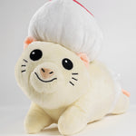 A front view photo of a mouse plushie with a round hat and a white diaper. The plushie is of Drawfee's character Todd. From Drawfee.