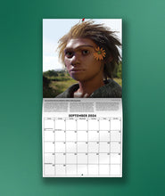 The September page of the Eons 2024 Calendar in front of a green background. The image is of a person looking into the distance with a flower tucked behind their eair.