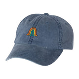 A blue pigment-dyed cap with the Rainbow Gubbins’ design on the front. From Gubbins.