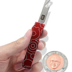 A hand holding an open red bottle opener. To the side is a coin with an image of Nigel from NileRed and the text "2 Nile Bucks; 2025" with a diamond fractal pattern.