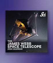 The cover of the SciShow 2024 Calendar in front of a purple background. The cover is a photo of the James Webb Telescope. 