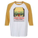 White baseball shirt with heathered mustard yellow 3/4 sleeves. Illustration of silhouetted people dancing in front of a body of water and mountains with an eye sunrise. Shirt says, "Secret Sleepover Society, Summer Conclave, Experience the Gathering! Tell no one! Bring your friends! Archery | Campfire Stories | Crafts | Survival Skills | Cannon Ball Dodge | Observation | Don't Look | Banjo | Survive | Happenings | Wiffle Ball | Cooking | Stars"