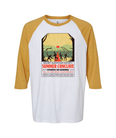 White baseball shirt with heathered mustard yellow 3/4 sleeves. Illustration of silhouetted people dancing in front of a body of water and mountains with an eye sunrise. Shirt says, "Secret Sleepover Society, Summer Conclave, Experience the Gathering! Tell no one! Bring your friends! Archery | Campfire Stories | Crafts | Survival Skills | Cannon Ball Dodge | Observation | Don't Look | Banjo | Survive | Happenings | Wiffle Ball | Cooking | Stars"
