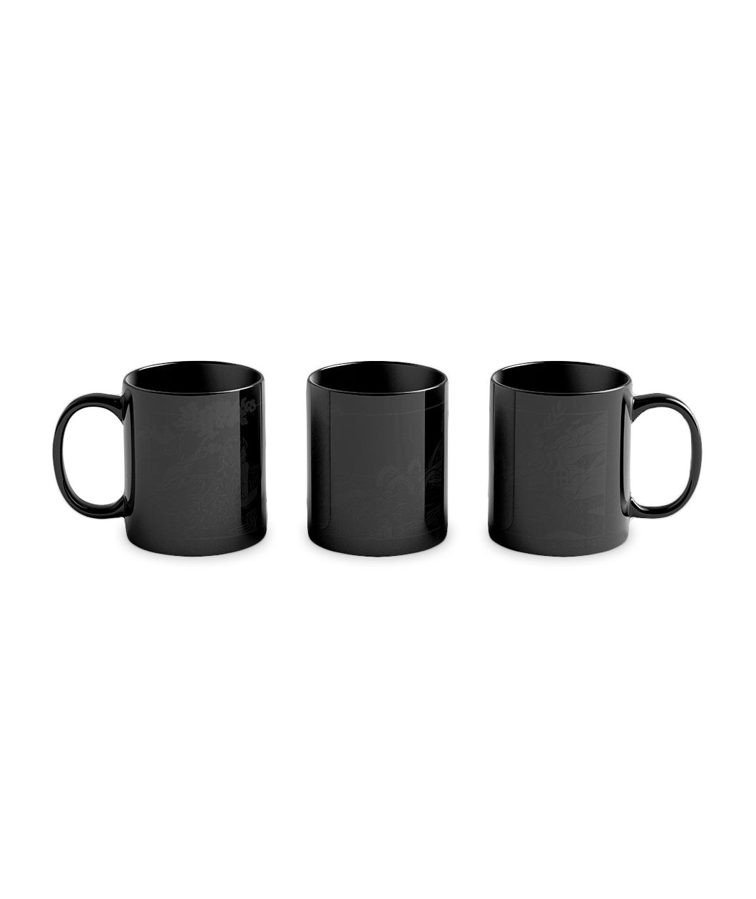 A line of three black mugs from Spirits looking completely black before they change color to reveal an image.