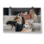 A photo of a couple, their baby, and their 3 dogs sitting on a couch - by Charles Trippy