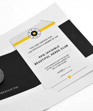 A white card with yellow accents and black writing indicating membership in the Beautiful Nerds Club - by 99% Invisible