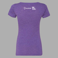 Back of purple curved cut shirt. Below the collar, "Physics Girl” is in white sans serif font. To the left, a stylized “P” is in white. Above is half an arrow. To the right is the “PBS Digital Studios” logo - from Physics Girl