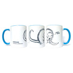 Three mugs in different positions to show design. Mug is white base with blue handle and blue inside. First: Black outline of tail of porcupine with writing on bottom left that says, “Kemosabe Coendou prehensilis” in black sans serif font. Second: Black outline drawing of porcupine with white filling eating a banana. Third: Black outline drawing of head and hands of porcupine eating a banana with, “nom nom,” in black sans serif font with a line near words coming from mouth - from Animal Wonders
