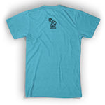 Back of blue shirt with Animal Wonders logo below collar. Logo is of black cartoon silhouette drawing of monkey with spiral tail is above “Animal Wonders INC” with each word in black, all caps, sans serif font, and varying sizes. INC is on its side at end of the word Wonders, which are below Animal - from Animal Wonders