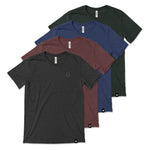Four shirts lined up together, one dark green, one dark blue, one dark red and one grey. Each has a subtle beaker logo from CGP Grey. 