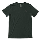A dark green t-shirt with a small, subtle beaker logo from CGP Grey in the top left area of the shirt. 