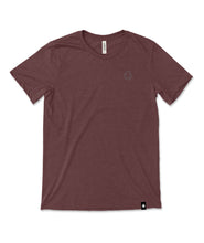 A dark red t-shirt with a small, subtle beaker logo from CGP Grey in the top left area of the shirt. 