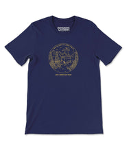 Navy blue t-shirt with yellow illustrated line drawing of a town with a UFO over it that says in small lettering "THE GLENN CLOSE TRIO 2015 AMERICAN TOUR"