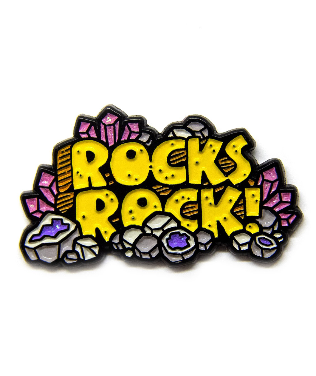 Black Plated enamel pin with the words ROCKS ROCK! illustrated in yellow to look like bedrock, surrounded by pink glittery crystals and cut open geodes with glittery purple enamel to signify the amythest inside.