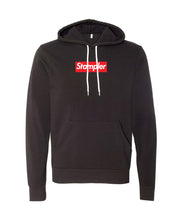 Black hoodie with white draw strings and red screenprinted rectangle in the middle with white words "Stampler" on it to look like the Supreme logo.