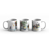 A line of three white mugs each showing a different portion of the mug. The illustration on the mug features a plant, brewing coffee in a pour over, and other counter items. 