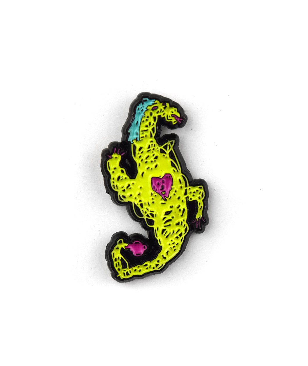 A Hank Green enamel pin of a crude dragon drawn out of scribbles. The dragon is green with a blue mane of hair and has a yellow heart and tail.