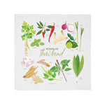 A tea towel from Hot Thai Kitchen showing colorful illustrations of different herbs of Thailand.