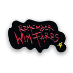 A black pin that is blob shaped with the words "Remember Wim Faros" written in red and a small yellow star. From It Makes a Sound.