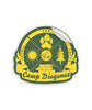 A sticker of a yellow crest on a dark green background that reads "Camp Diogenes" and has a paw print, tree, sun and wall icons as well as the Join the Party logo in the center.