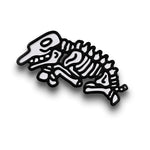 A pin of a black and white zebra skeleton.