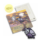 A vulture pin on a pin backing that gives facts about the vulture.