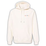 White hoodie with “code;” in the top right of each hoodie. “Code;” is in red, pink, blue, yellow, and orange, respectively - from Mayuko Inoue
