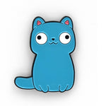 Blue cartoon cat pin with black outline. Two small paws are at the bottom with a tail coming out of the bottom left. Two white eyes with black pupils looking off in opposite direction - from Physics Girl