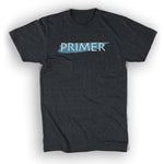 A dark gray shirt with “Primer” in white sans serif font. A blue paint streak is behind the text - from Primer