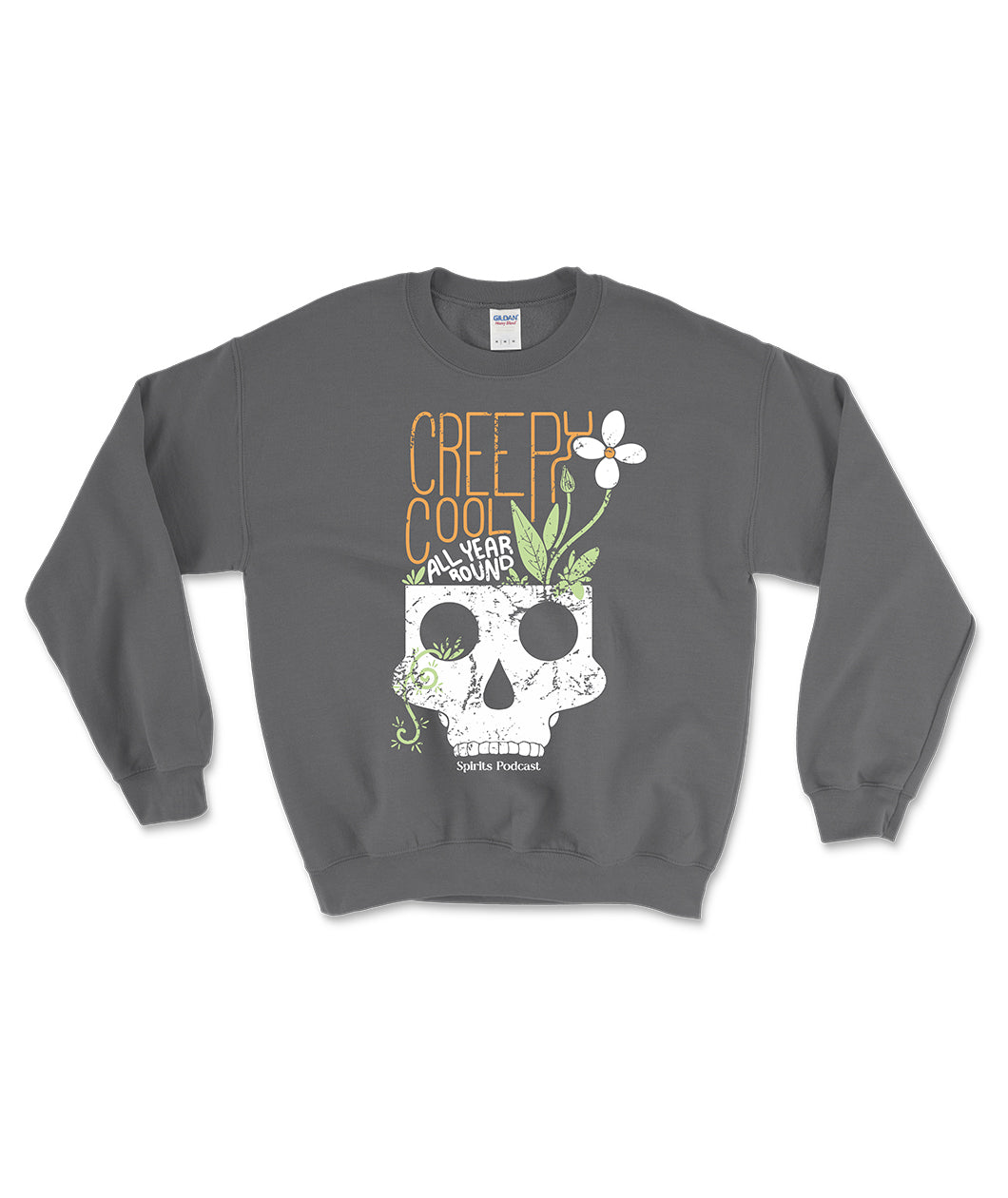 A grey crewneck with a simple illustrated skull with a flower growing out of the top and the words "Creepy cool all year round" resting on top. In small text below the skull it reads "Spirits Podcast". 