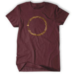 Maroon shirt with a circle of music notes and bars in metallic copper ink in the center of the shirt - from Vi Hart