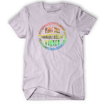 Lavender color shirt with “Pi Day 2022 Chromatic Challenge Winner” written in warped, serif font surrounded by a circle of music notes and bars all colored in  metalic rainbow in center of shirt - from Vi Hart