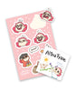 Two items on top of each other: A rectangular pink sticker sheet that contains 9 stickers of cartoon drawings of Beanie and pets. A signed square bookplate that has a drawing of Beanie sketching a scene and the signature "Alina Tysoe."