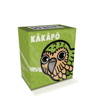 A green box with various bizarre beasts silhouette designs. “KAKAPO” is in the top left in white sans serif font. A cartoon drawing of a kakapo head takes up the majority of the box - from Bizarre Beasts.