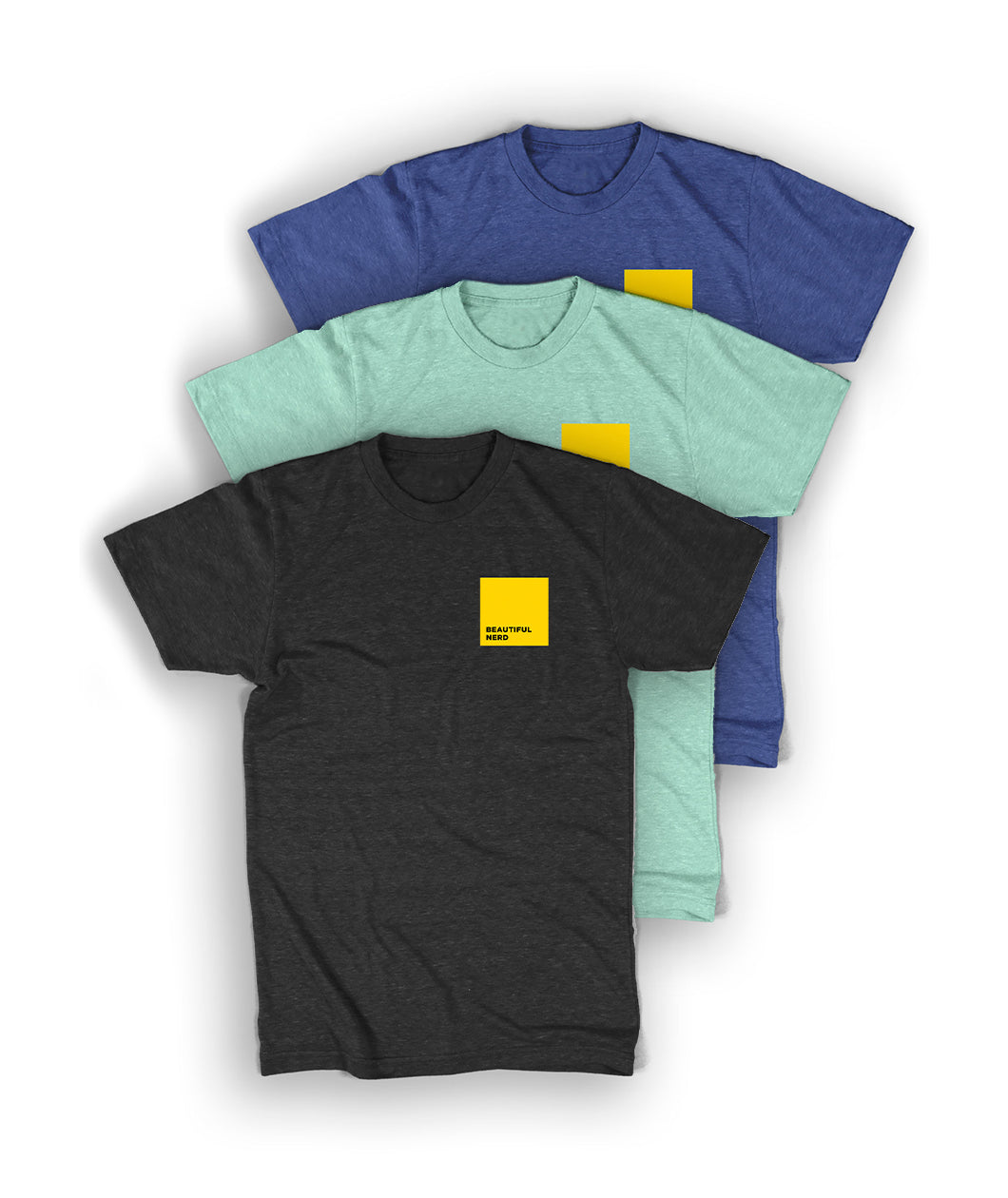 3 of the same t-shirt in grey, mint, and royal blue - by 99% Invisible