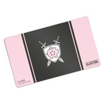 A pink rectangular playmat with curved corners. In the center, there is a black square. A pink line and black line are on either side. In the center of the square, there is a gray shield with a pink piggy bank with a quarter being inserted. Two gray swords are behind. “Close Quarters” is in the bottom left. “The Commander’s Quarters” in the bottom right - from Commander’s Quarters