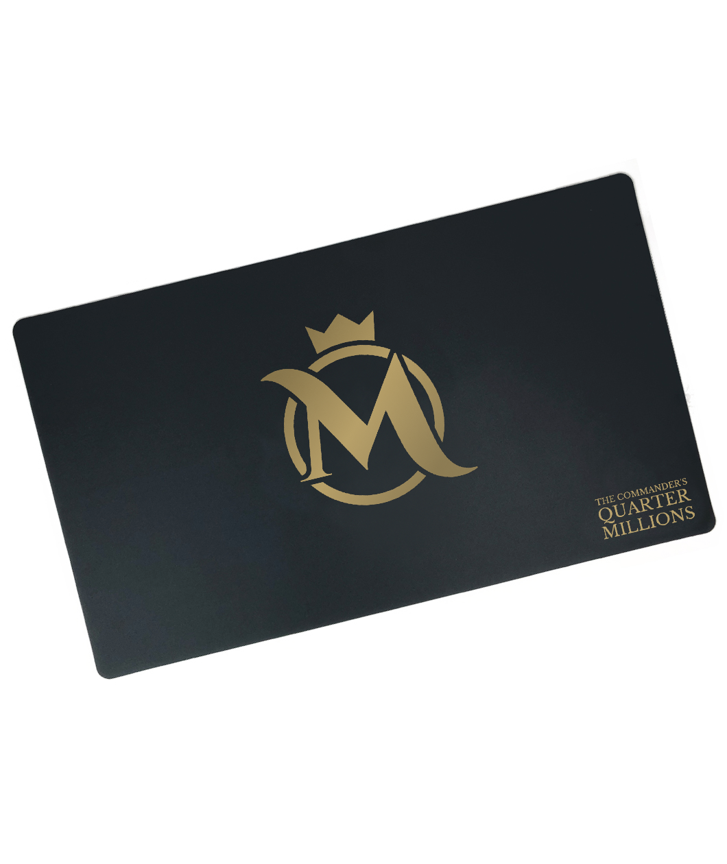 A black rectangular playmat with curved edges. In the center, a gold stylized M is in front of a gold circle. A gold crown is above. “The Commander’s Quarter Millions” is in the bottom right in gold serif font - from the Commander’s Quarters