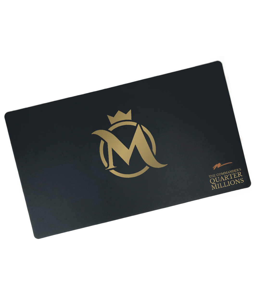 A black rectangular playmat with curved edges. In the center, a gold stylized M is in front of a gold circle. A gold crown is above. “The Commander’s Quarter Millions” is in the bottom right in gold serif font with a signature above - from the Commander’s Quarters