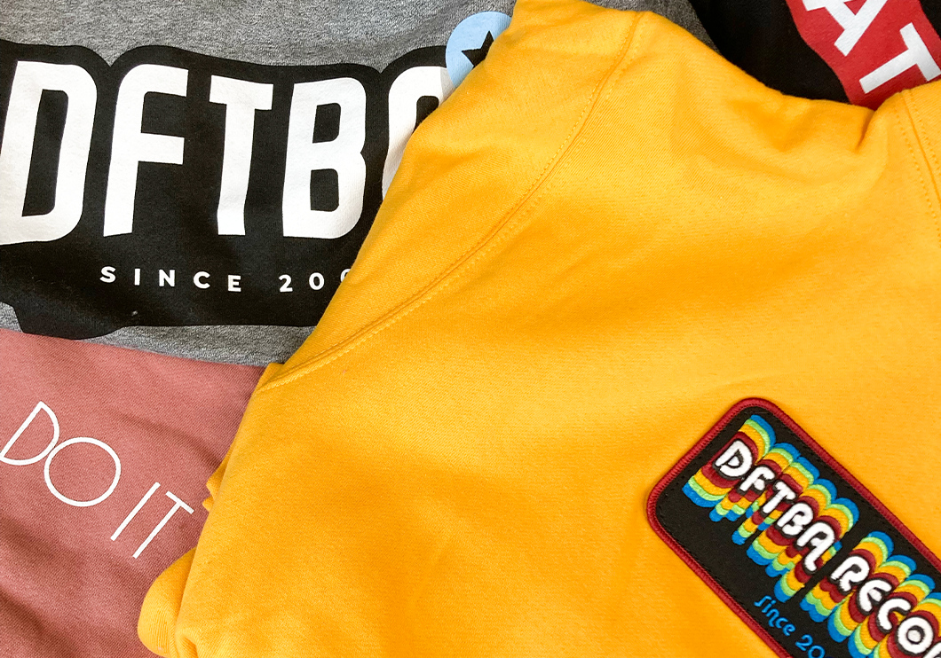 Four various sweatshirt designs that are a part of DFTBA mystery sweatshirt sale - from DFTBA Records