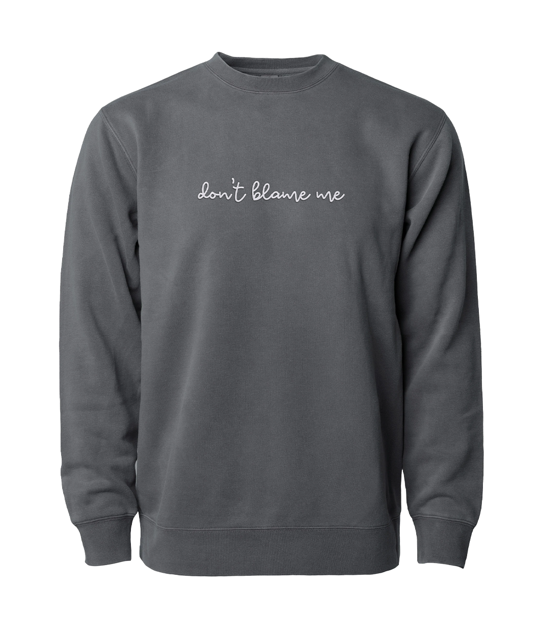 Gray crewneck sweatshirt with “don’t blame me” across chest in white cursive font - from Don’t Blame Me