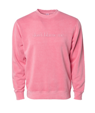 Pink crewneck sweatshirt with “don’t blame me” across chest in pink serif font - from Don’t Blame Me