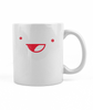 A white mug with a red, open mouthed smily face depicting the Drawfee logo. 