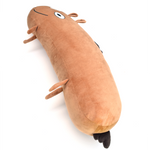 The Jacob Horse plushie is an oblong light brown horse with a crooked smile and eyes on one side of its body. It has little legs, ears and a mane and tail. 